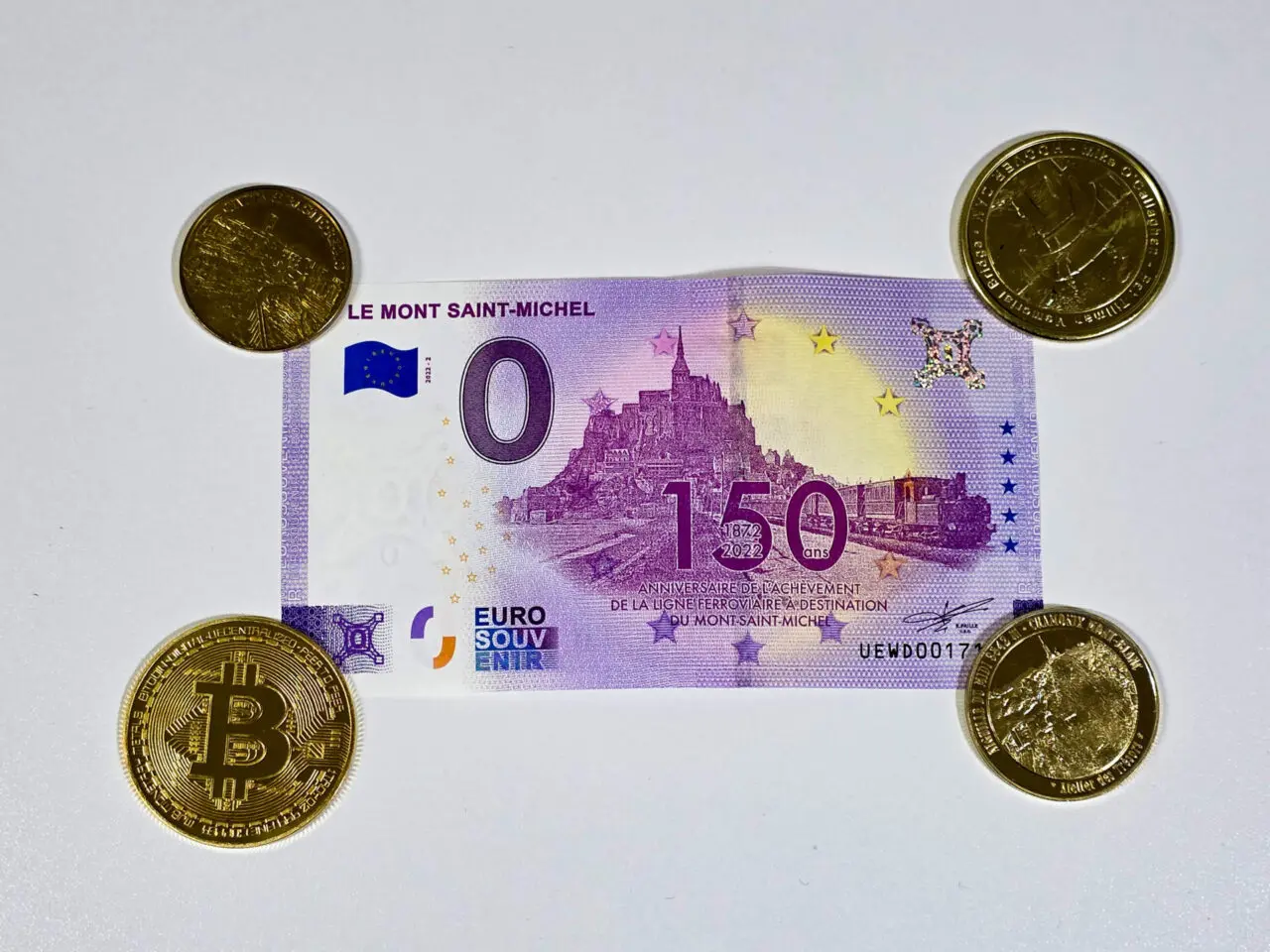 Mont Saint-Michel commemorative zero euro souvenir bill with abbey image and gold coins