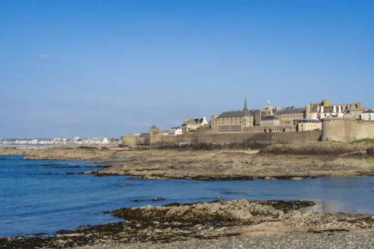 View of Saint-Malo ramparts from Grand Bé highlighting fortified walls and historic old town